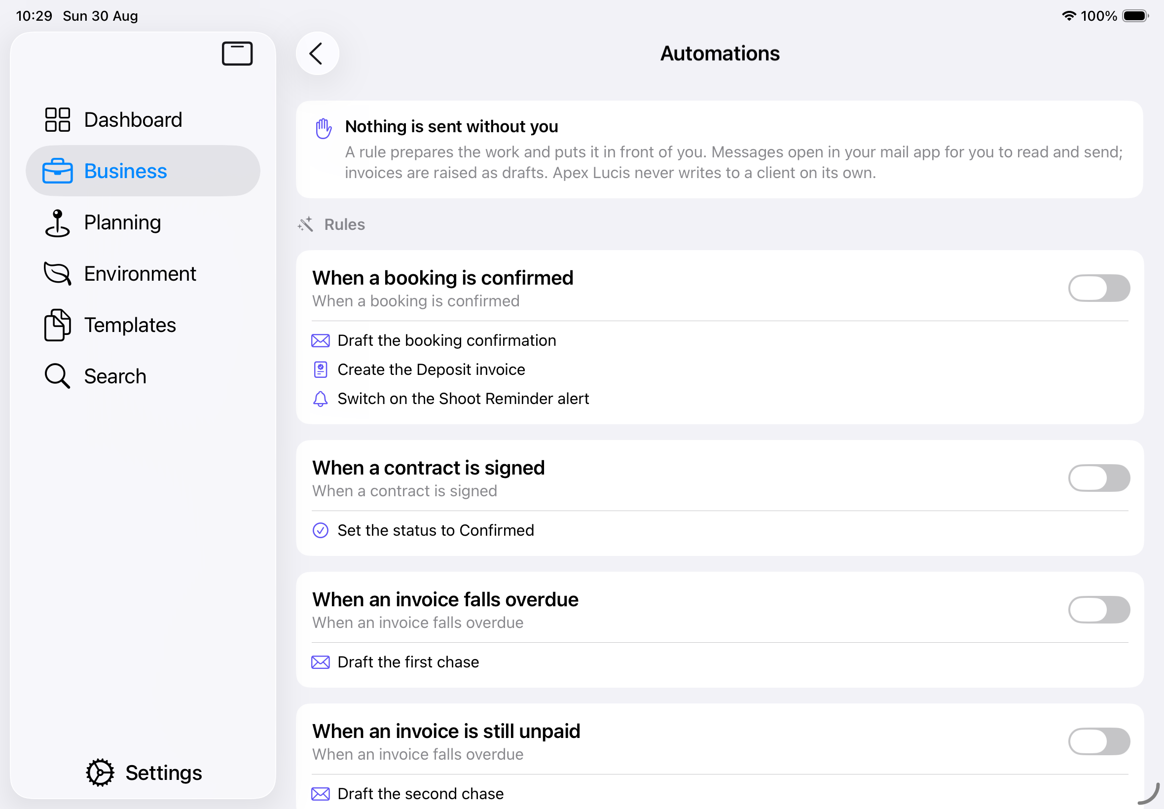 Screenshot: Business → Automations on iPhone. A card at the top headed "Nothing is sent without you". Below it a "Waiting for you" section with two draft cards — "Draft the booking confirmation" for Harper wedding and "Create the deposit invoice" — each with Review & Send and Discard buttons. Beneath that a "Rules" section listing each rule with a switch, its trigger underneath, and the actions it will take.